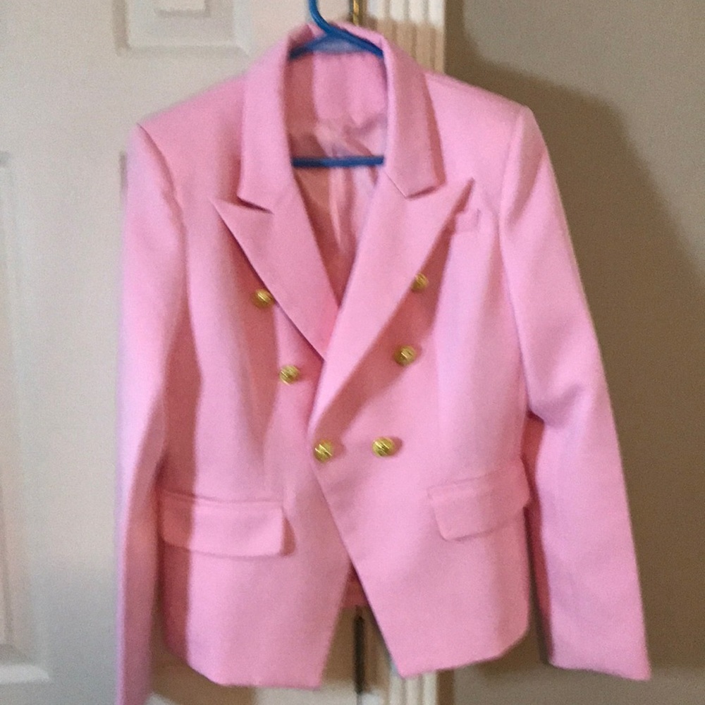Beautiful pink blazer new without tags.
